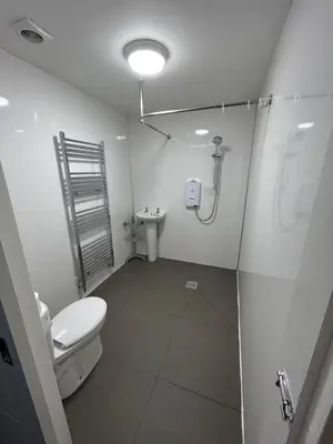 a bathroom with a toilet and a sink at Tigh-Na-Croit in Whitehouse