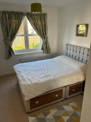 a bed in a bedroom with a window at Westcoast-Retreat-Largs in Largs