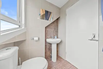a bathroom with a toilet and a sink at Charming Village Escape 3-Bed near Loch Lomond in Drymen