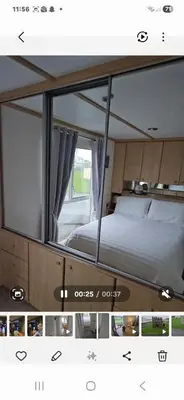 a mirror image of a bed in a room at Montrose No3 - Turnberry Holiday Park in Turnberry
