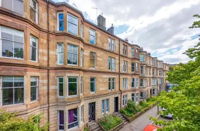 a large brick building with lots of windows at FREE Pool Table Cinema Room TableTennis AirHockey Glasgow City in Glasgow