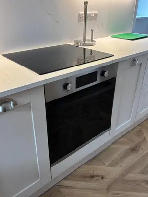 a kitchen with a sink and a dishwasher at Craigievar Cottage Skelmorlie in Skelmorlie