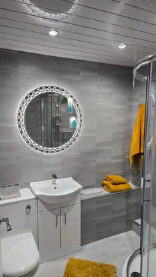 a bathroom with a sink and a mirror at Exceptional 1 bedroom riverside 2E apartment in Ayr