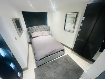 a small bedroom with a bed in a room at 96 Glasgow road in Newbridge
