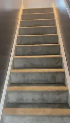 a set of stairs in a building at 4 Bed Detached Home Perfect for Families & Groups in Glasgow