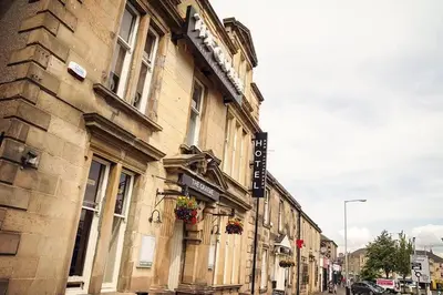 a building on the side of a street at The Graeme Hotel in Falkirk