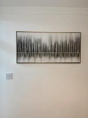 a picture of trees on a wall at Morden 2 bedroom in Edinburgh City in Edinburgh