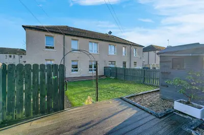 a backyard with a fence and a house at Executive 3 Bedroom - Corporate And Contractor Stays in Glasgow