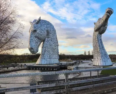 two large statues of a horse and a pigeon at Beechtree Timber Lodge 69A in Denny