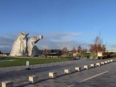 a large statue of a dog in a park at Beechtree Timber Lodge 69A in Denny