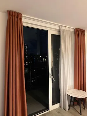 a room with a sliding glass door with a window at Chalk in Moffat