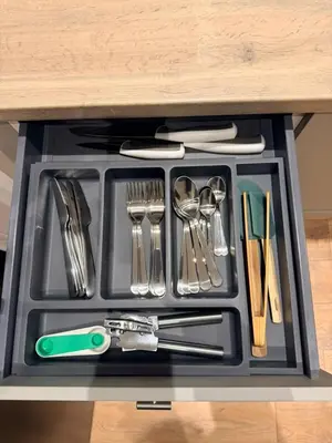 a tray with utensils sitting on a table at The perfect place we call home 2 in Dumbarton