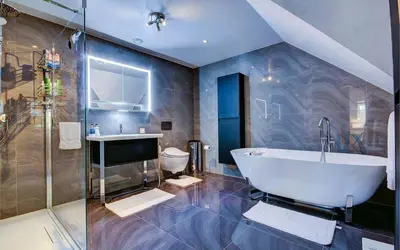 a bathroom with a tub and a shower and a sink at Scone Cottage - Luxury retreat, outstanding views in Craobh Haven