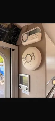 a cds and a tv on a wall at 4 berth caravan in Doune