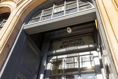 an entrance to a building with a sign on the door at The Sauchie in Glasgow