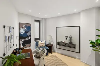 a living room with a couch and a tv at Bright 3BR London Flat w Full Kitchen in Moffat