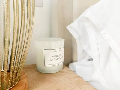 a candle sitting on top of a table at Stunning River View City Centre Apartment in Glasgow