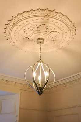 a chandelier hanging from a ceiling at Gordon's Getaway Lux in Oban