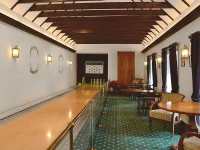 a dining room with tables and chairs in a room at Holiday Home Gehöft 2 by Interhome in Tweedsmuir