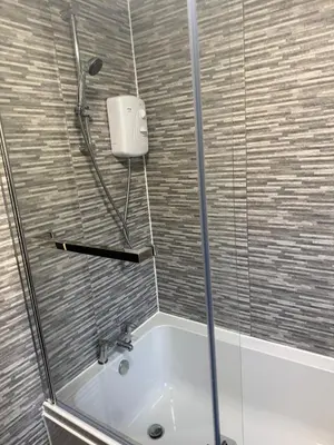 a shower in a bathroom with a bath tub at 2BR Sleeps 4 Albion Gate Glasgow City Centre in Glasgow