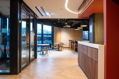 a view of a restaurant with tables and chairs at For Students Only - Haymarket Yard in Edinburgh in Edinburgh