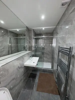 a bathroom with a sink and a shower at Skips in Largs