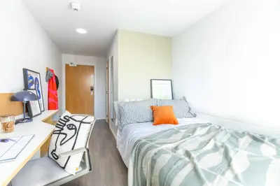 a bedroom with a bed and a desk at For Students Only - Dunaskin Mill in Glasgow in Glasgow
