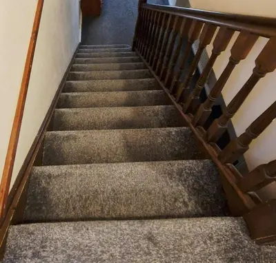 a set of stairs in a house withgraded at Victory Room in Moffat