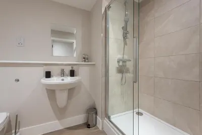 a bathroom with a shower and a sink at Chic 1Bed in Hull City Centre near Hull College in Moffat