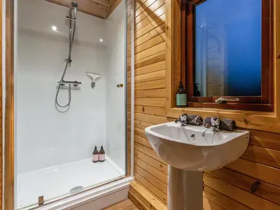 a bathroom with a sink and a shower at Here - Uk50566 in Port of Menteith