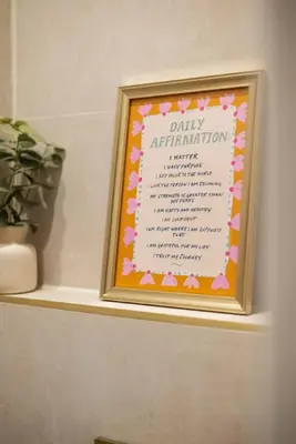 a sign in a frame on a shelf at Boutique Studio Near Stirling in Cambusbarron