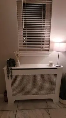 a window with a table with a lamp and a plant at Stylish, Modern 3 bedroom house, free parking x 2 in Mansewood