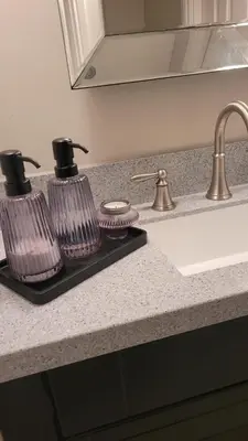 a kitchen counter with a sink and two juicer at Stylish, Modern 3 bedroom house, free parking x 2 in Mansewood
