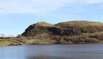 an island in the middle of a body of water at Newton Mearns Home in Newton Mearns