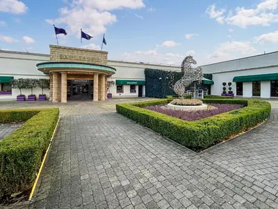 a building with a fountain in the middle of a courtyard at Lodge 2 - Uk51263 in Glasgow
