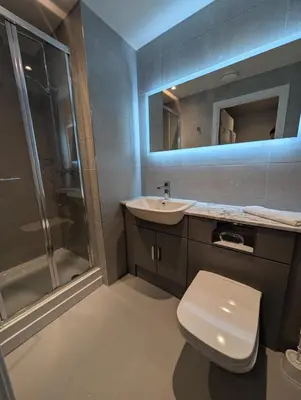 a bathroom with a toilet and a sink and a shower at For Students Only West End in Glasgow in Glasgow