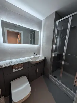 a bathroom with a toilet and a sink and a shower at For Students Only West End in Glasgow in Glasgow