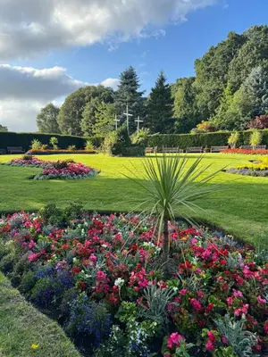 a garden with colorful flowers in a park at Auldhouse Apartment entire place 2 bedrooms in Mansewood