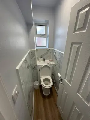 a small bathroom with a toilet and a sink at 3x Large Double bedroom, Central London flat in Moffat