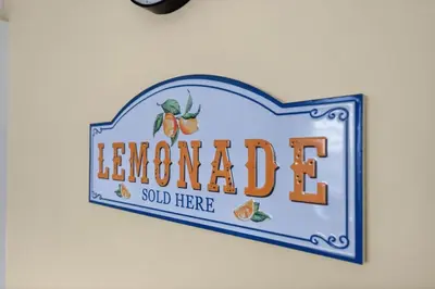 a sign for a lemonade sold here on a wall at Troon Golf by the Sea in Troon