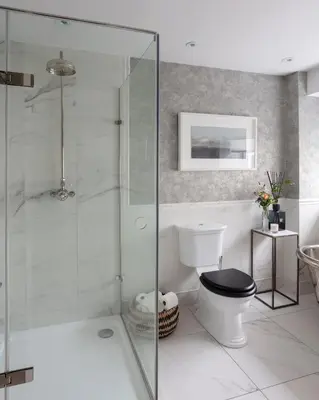 a bathroom with a glass shower and a toilet at Stylish Retreat Auchterarder in Auchterarder