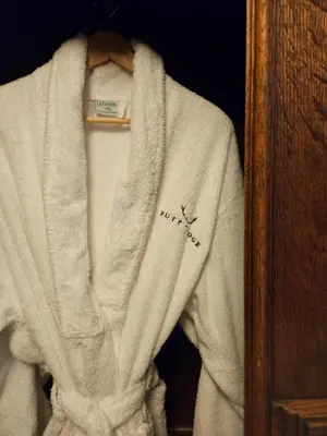 a white sweater with a name on it on at Butt Lodge in Lochranza