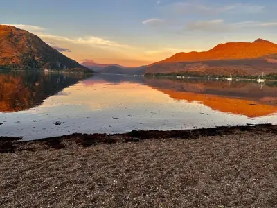 a view of a lake with mountains in the background at Ceo Mara Croft b&b & 2 luxury Cabins in Taynuilt