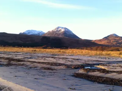 a view of the mountains from the road at Braeside Craighouse Jura in Craighouse