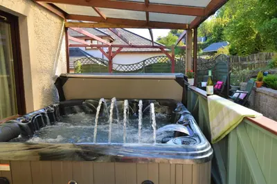 a water fountain in the middle of a patio at Clydeside Villa in Dunoon