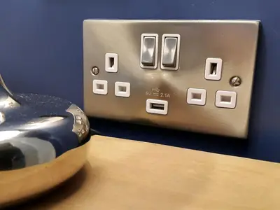 a close up of an electrical outlet on a table at Edinburgh Nine in Edinburgh