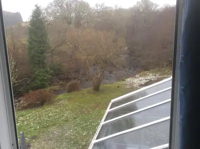 a view of a river from a window at Riverside Cottage B&B in Cladich