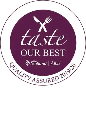 a purple and white sticker with a knife and fork at Garrison Farm with Hot Tub in Inversnaid