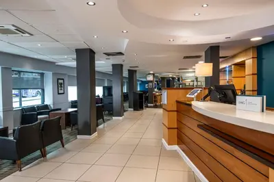 a lobby of a hospital with a waiting room at Holiday Inn Express - Glasgow - City Ctr Riverside by IHG in Glasgow
