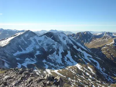 a view of a mountain with snow on it at Glenachulish Bay with Hot Tub in Glencoe